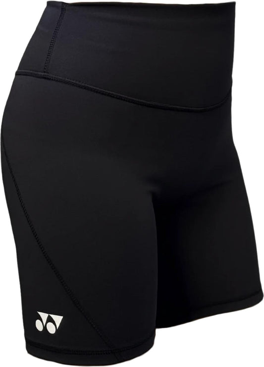 The Yonex YTS2024 Women's Core Tennis Shorts in black feature a high waistband, a small white geometric Yonex logo, and fitted moisture-wicking fabric—ideal for sports or exercise.