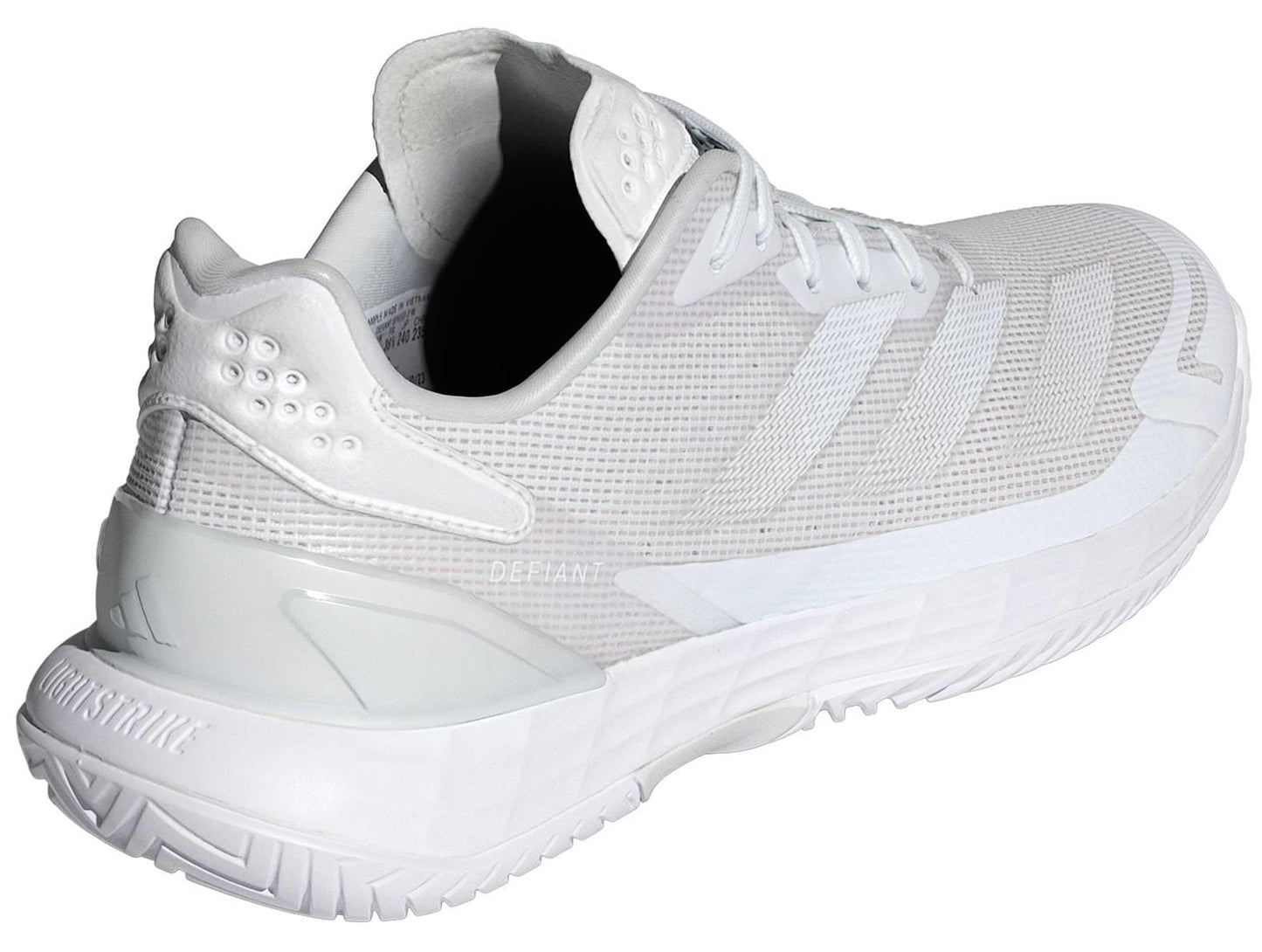 The adidas Defiant Speed 2 Womens Tennis Shoes in white are shown from the back left, highlighting a textured sole, mesh upper, striped sides, and reinforced heel for a lightweight, sporty look.