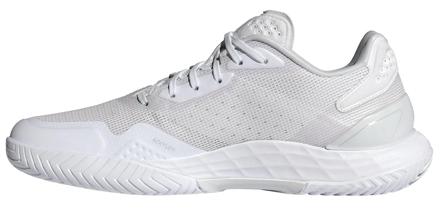 The adidas Defiant Speed 2 Women's Tennis Shoes in white feature a mesh upper, white laces, and a textured rubber sole. These lightweight sneakers are shown in a side view against a plain background.