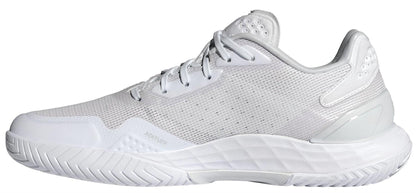 The adidas Defiant Speed 2 Women's Tennis Shoes in white feature a mesh upper, white laces, and a textured rubber sole. These lightweight sneakers are shown in a side view against a plain background.