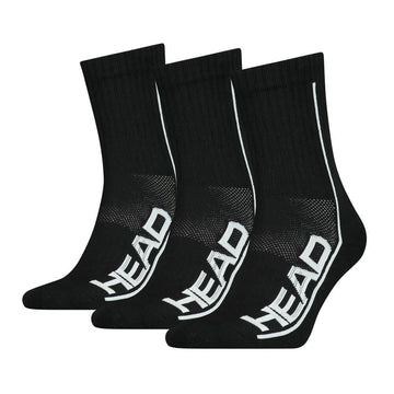 A set of three HEAD Performance Tennis Socks (3 Pack) in black with "HEAD" written in white along the sides, equipped with cushioned soles for shock absorption, are arranged in a row against a white background.