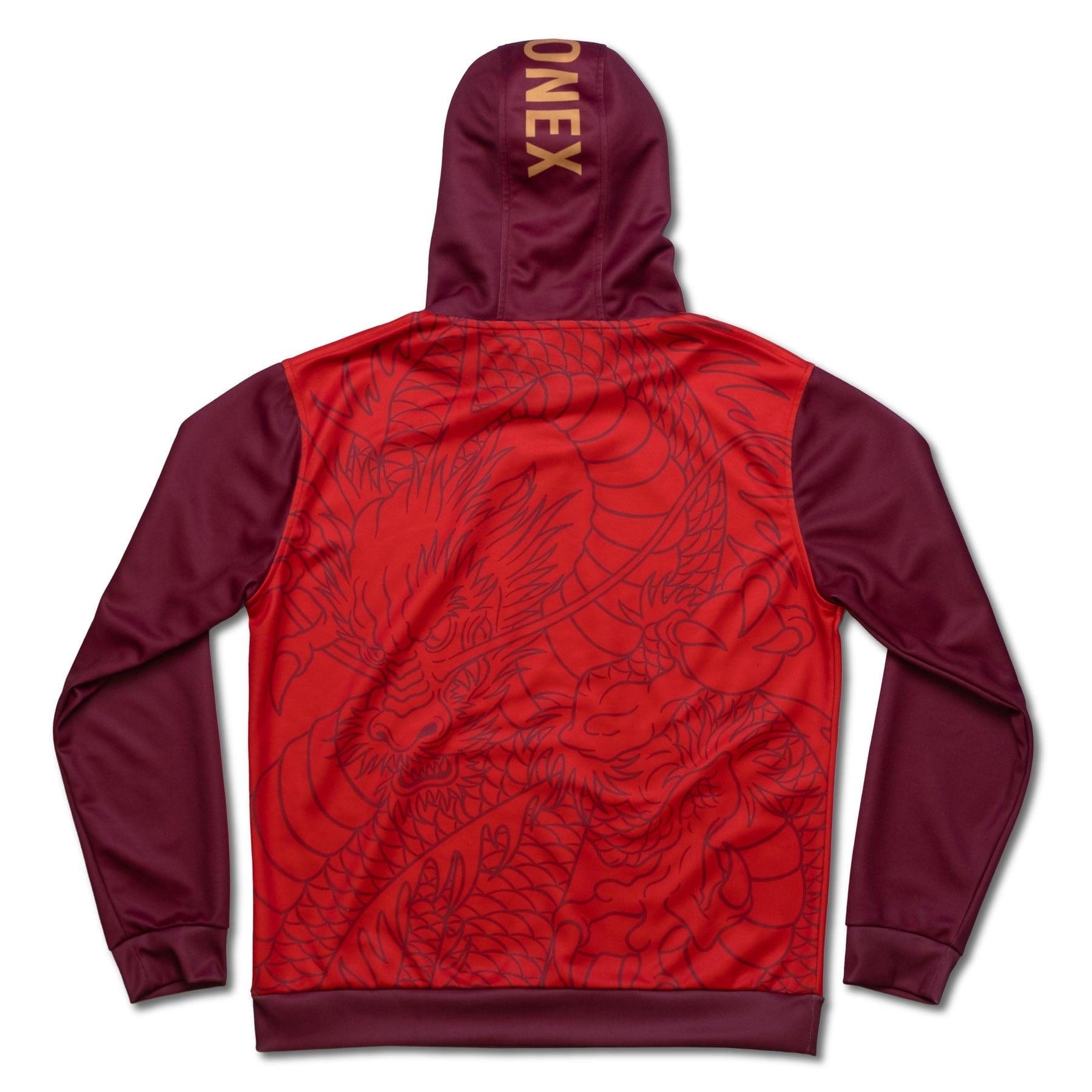 Introducing the Yonex CNY2024 Linear Dragon Unisex Tennis Hoodie, an ideal choice for Chinese New Year celebrations. This red piece features a detailed dragon design on the back, complemented by "ONE X" in gold on the hood. The sleeves and sides are maroon, while the main body showcases the intricate pattern beautifully.