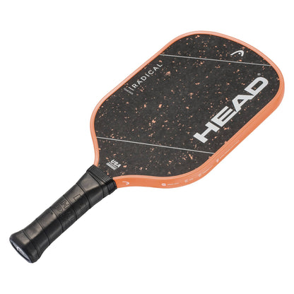 The HEAD Radical Tour EX15 2026 Pickleball Paddle by HEAD features a striking black design with orange edges, a black grip, bold "RADICAL" text, and a speckled pattern on the paddle face. Crafted using advanced thermoformed construction, this paddle offers enhanced durability and performance.