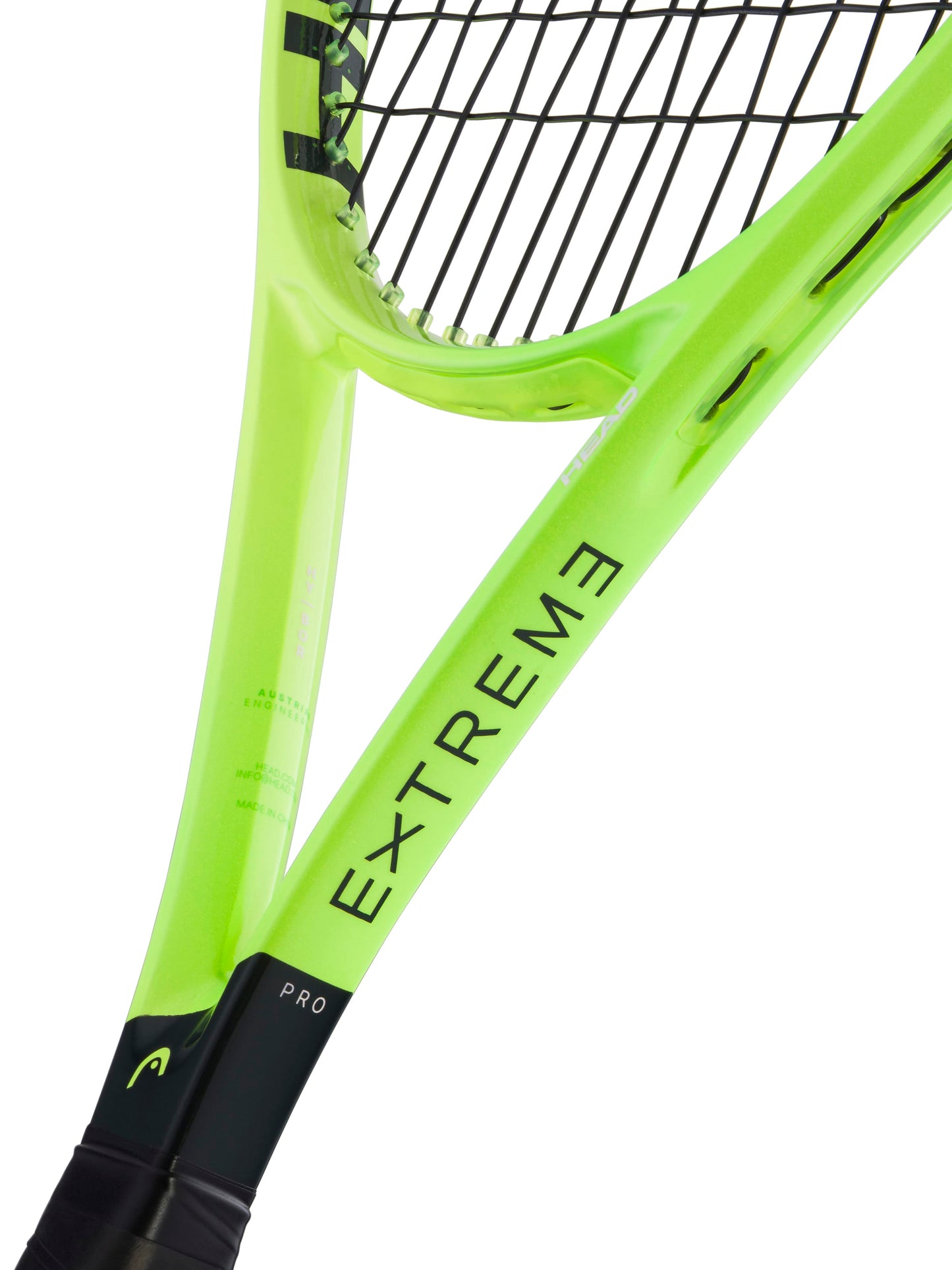A close-up view of the HEAD Extreme Pro 2026 Tennis Racket, a control-oriented model in neon yellow-green with black strings and "EXTREME" displayed on the frame. The handle, partially shown, features "PRO," emphasizing its heavy spin capabilities.