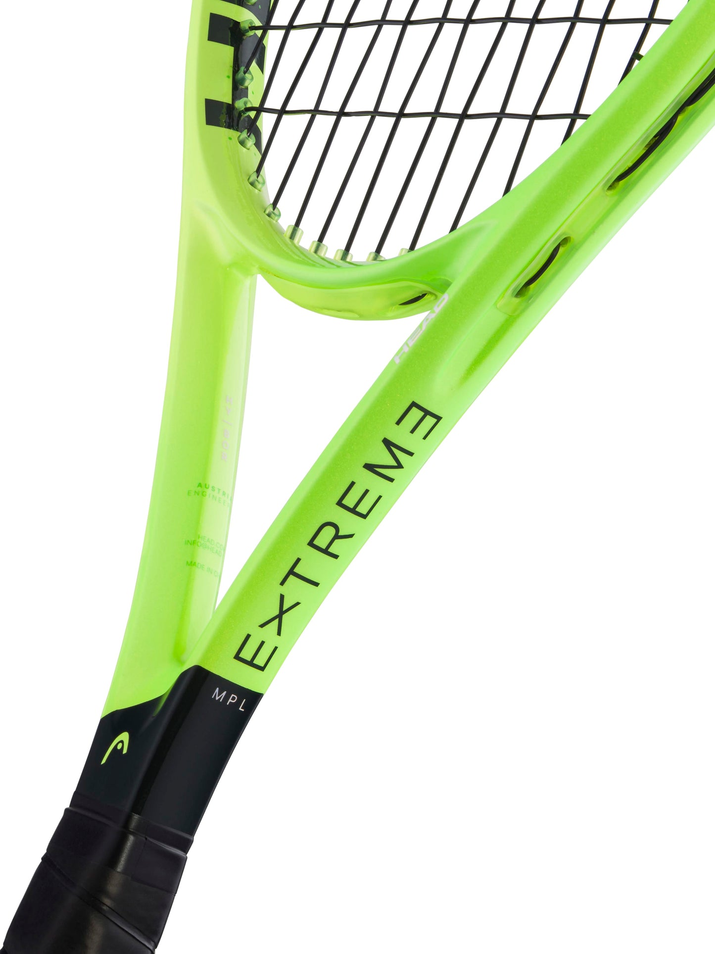A close-up of the HEAD Extreme MP L 2026 Tennis Racket displays its neon green, spin-friendly frame with “EXTREME” printed along the side. Black strings span the racket’s head, while a portion of the black handle from this HEAD model is visible at the bottom.