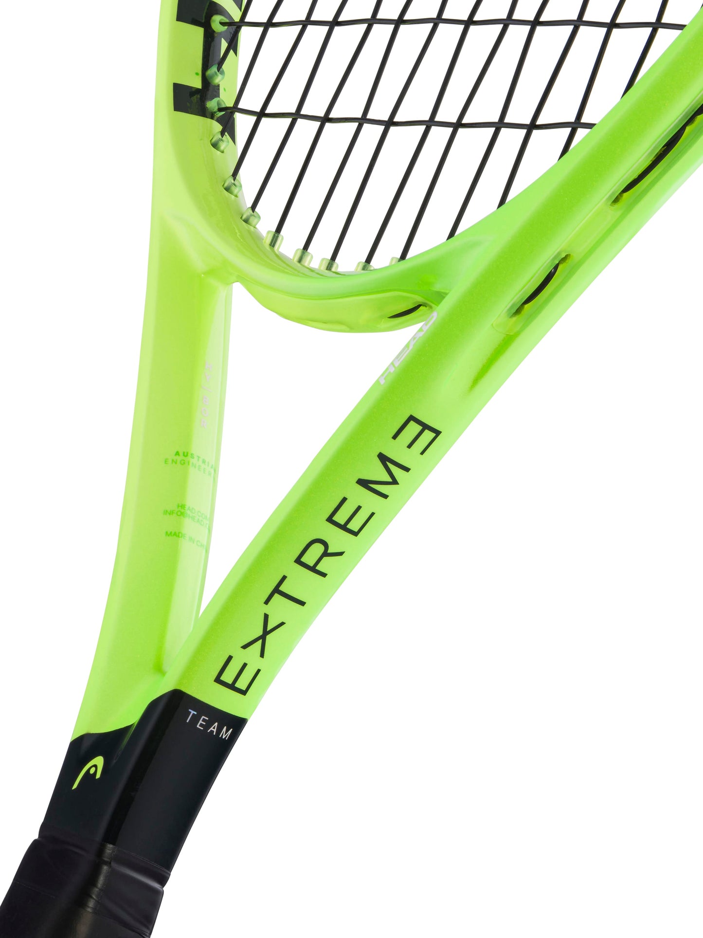 A close-up of the HEAD Extreme Team 2026 Tennis Racket showcases its neon green frame with bold "EXTREME" lettering, black strings, and visible brand logo on the handle. Designed by HEAD for easy spin and effortless power, this performance-driven racket is built to elevate your game on the court.
