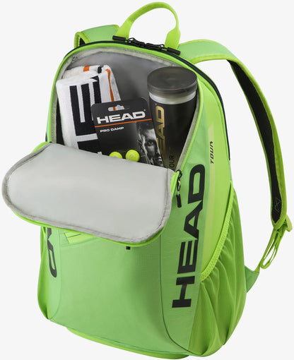 HEAD Tour 25L Tennis Backpack - Sharp Green by HEAD, shown open to display contents including a towel, HEAD Pro Damp vibration dampener, and a HEAD tennis ball canister.