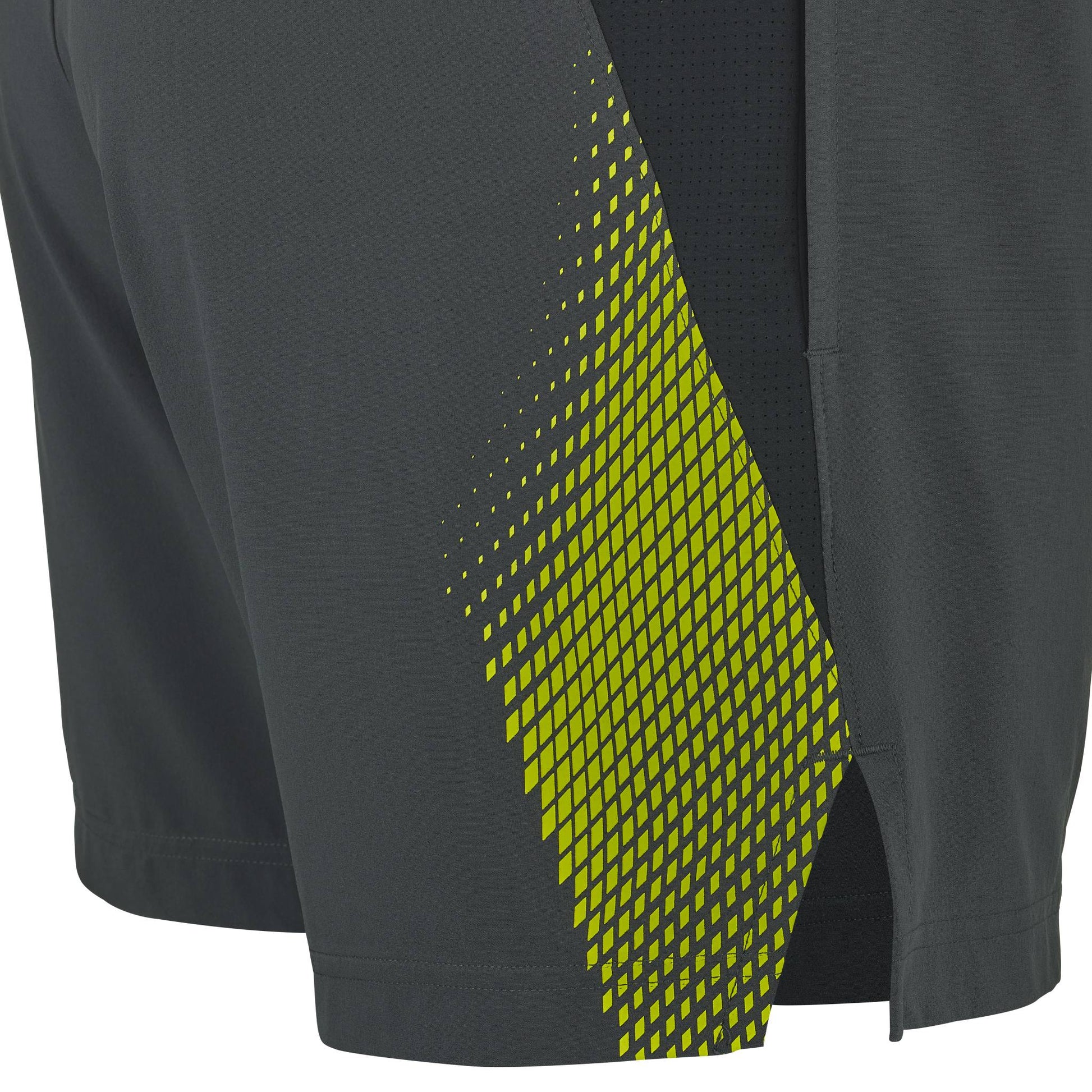Close-up of the Babolat Aero Mens Tennis Shorts in Grey/Aero, showcasing a bold yellow diagonal geometric pattern on one side and a small hem slit—perfect for performance tennis. Ideal for men's tennis clothing, these Babolat shorts blend style and comfort for play on the court.