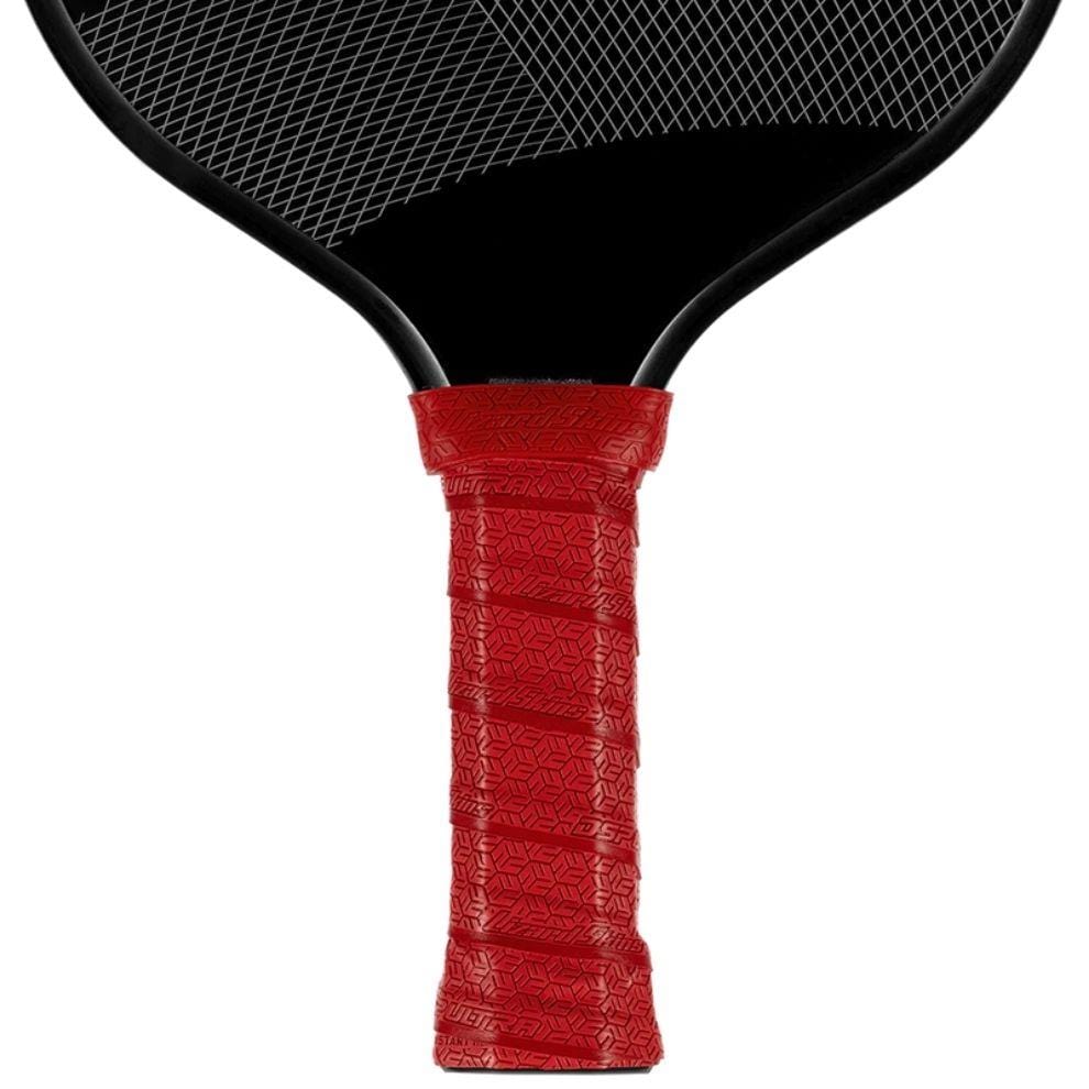Close-up of the handle and lower part of a black paddle featuring the Lizard Skin DSP Ultra Pickleball Grip 0.8mm in Crimson Red, providing a non-slip, geometric grip for enhanced control in pickleball or paddle tennis.