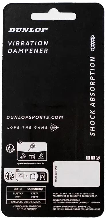 The Dunlop ATP Flying D Tennis Vibration Dampener - Blue’s back packaging shows branding, product name, website, recycling icons, and explains its string vibration reduction for improved shock absorption. The black design uses white text and symbols.