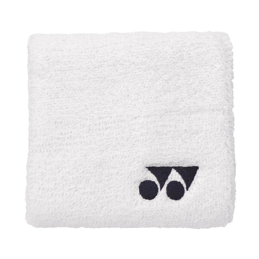 The Yonex AC493 Wristband in white is a cool and dry sweatband with a small black Yonex logo featuring two dots and a triangular shape. Made from textured, soft, absorbent material, it's perfect for keeping you comfortable.