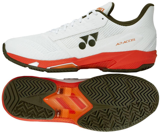 The Yonex Power Cushion Ad-Accel Men's Tennis Shoes in white and orange feature a herringbone-patterned sole for speed on court, orange accents, and "A3-ACCEL" branding shown from the side and bottom.