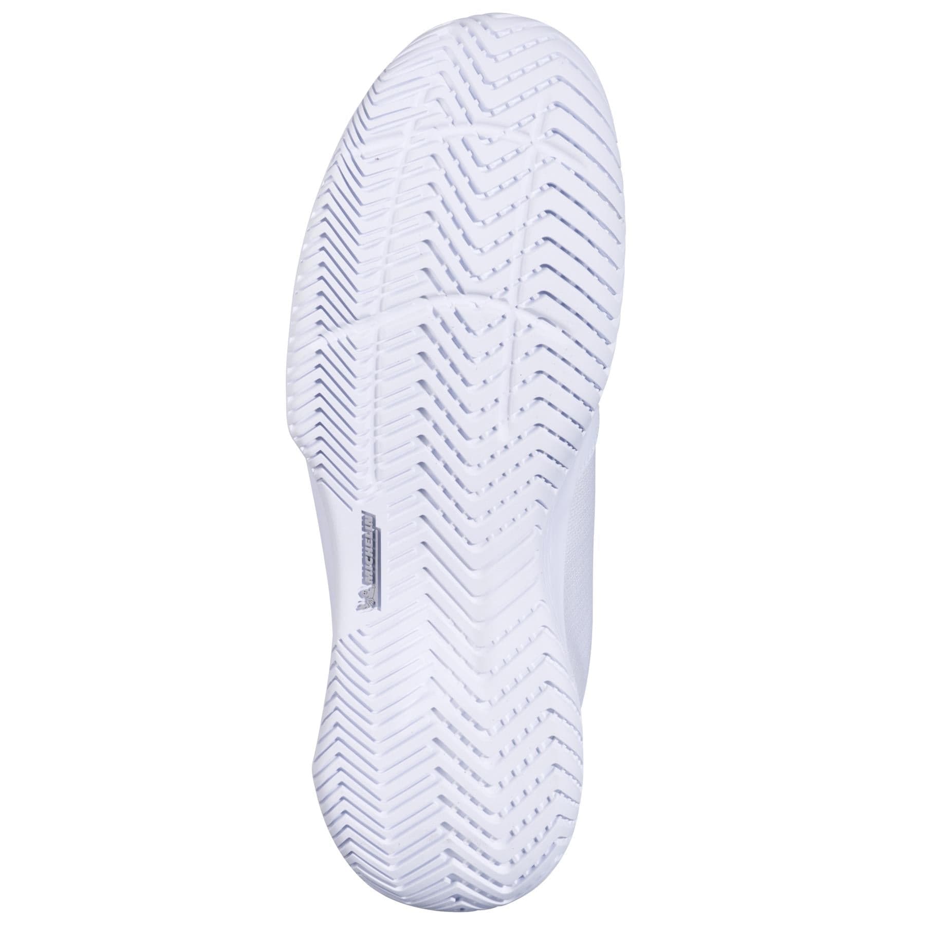 The image displays the white sole of the Babolat SFX Evo Men's Tennis Shoe, featuring a detailed herringbone tread pattern for grip and traction, with a small rectangular label—ideal for those needing wide tennis shoes.