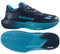 The Babolat SFX 4 All Court Men's Tennis Shoes in Black/Blue feature visible "Babolat" branding and a textured Michelin sole, shown from the side and bottom, for enhanced comfort and durability on court.