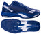 The Babolat Jet Mach 4 All Court Men's Tennis Shoes in dark blue and white feature the brand logo on the side and a textured, two-tone sole shown from both side and bottom views.