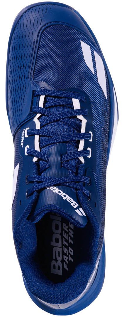 Top view of the Babolat Jet Mach 4 All Court Men's Tennis Shoe in dark blue and white, featuring white laces and "Babolat FASTER TO THE" branding on the insole—engineered for responsive agility on court.
