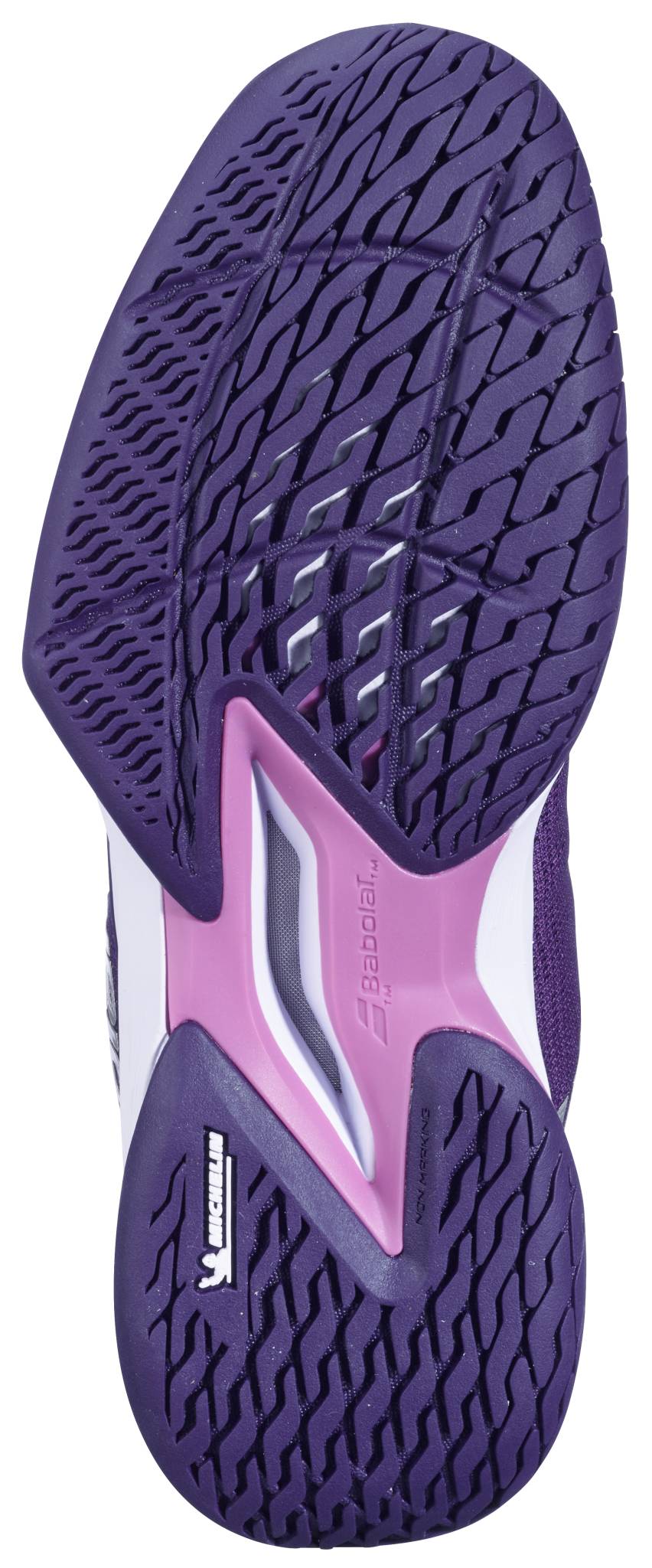 The image shows the sole of a Babolat Jet Tere 2 All Court Women's Tennis Shoe in dark purple and silver, featuring a textured grip pattern and the Babolat brand name on the bottom.