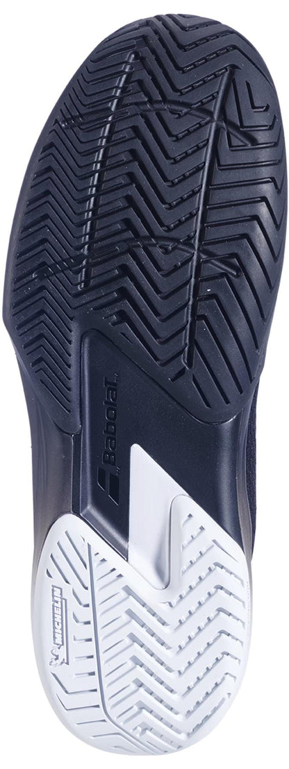 Close-up of the Babolat SFX 4 All Court Men's Tennis Shoe sole in Black/Illusion Blue, showing a herringbone tread for grip, Michelin logo, and an all-court comfort design.