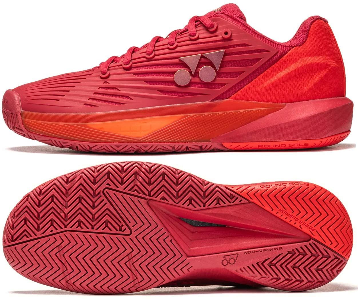 The Yonex Power Cushion Eclipsion 5 Men's Tennis Shoes in Ruby Red are shown from the side and bottom, featuring a herringbone sole, geometric upper design, and a Yonex logo with two circles and a triangle on the side.