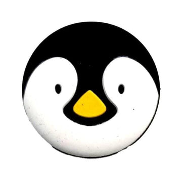 The Babolat Loony Damp Tennis Dampener - Penguin by Babolat features a playful, round cartoon penguin face with a black head, white face, small black eyes, and a yellow beak on a white background.
