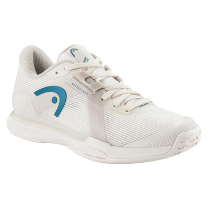 The HEAD Sprint Pro Women's Tennis Shoes in Chalk White/Twilight Blue feature breathable mesh uppers, a padded collar, textured sole for grip, and "Lateral Control" on the midsole for lightweight comfort. These athletic shoes have blue accents, a prominent logo on the side, and white laces.