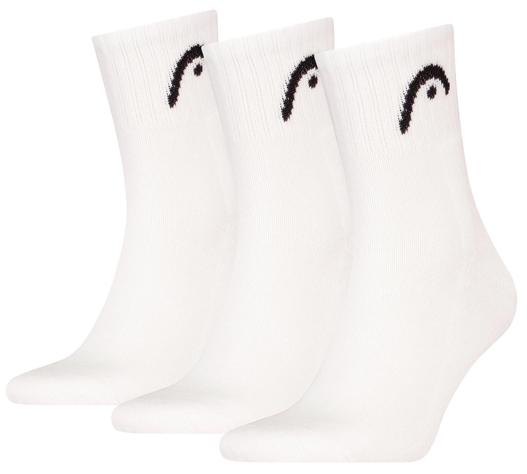 Three pairs of HEAD Club Short Crew Tennis Socks - White (3 Pack) are displayed upright, each featuring a small black HEAD logo near the top and cushioned soles for added comfort.