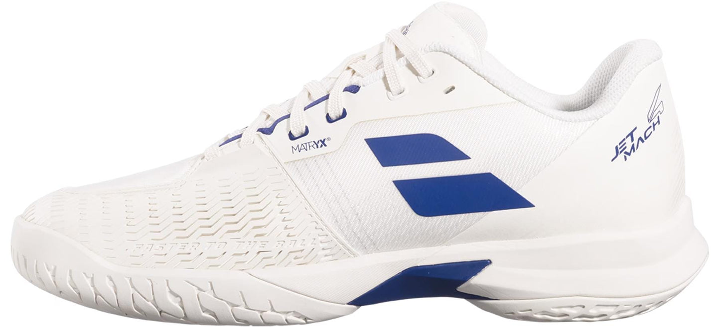The Babolat Jet Mach 4 All Court Men's Tennis Shoes in cream and dark blue feature textured soles for agility, blue logo accents on the side, and additional branding near the heel and laces.