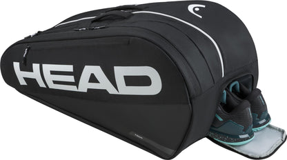 A HEAD Tour 9 Racket Tennis Bag L - Black by HEAD, with a large white logo and a partly open ventilated shoe compartment displaying black and teal athletic shoes.