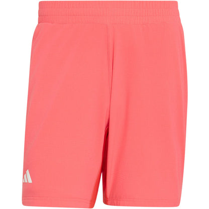 Inspired by the iconic adidas Ergo 9 Inch Men's Tennis Shorts in the Pure Turbo colorway, these bright pink athletic shorts feature an elastic waistband and a small white adidas logo on the left leg. The simple design is showcased against a white background.
