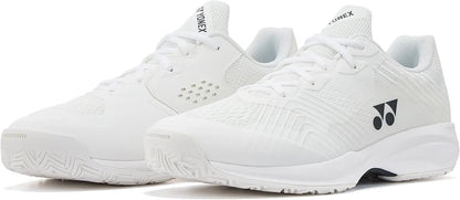 The Yonex Power Cushion Sonicage Wide Unisex Tennis Shoes in white feature mesh panels for breathability, laces, and the Yonex logo on the side. These lightweight shoes are shown on a white background.