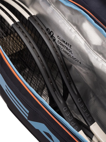 A close-up of the HEAD Pro 9 Racket Tennis Bag L - Navy shows several black rackets labeled “SPEED” and a “Climate Control Technology” tag, showcasing the advanced HEAD design for optimal climate control.