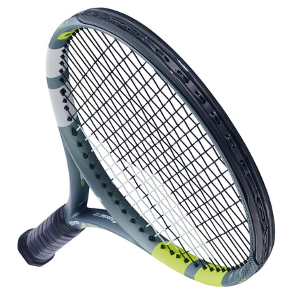 A close-up of the Babolat Evo Aero 2026 Tennis Racket shows its black and gray frame, black strings, and green accents, designed for intermediate to advanced players, displayed against a white background.