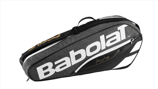 The Babolat RHX3 Pure Cross Tennis 3 Racket Bag in grey and white, featuring a shoulder strap for carrying up to three rackets and gear, is displayed on a white background.
