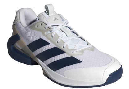 The adidas Adizero Ubersonic 5 Men's Tennis Shoes in white/navy feature three dark blue stripes, white laces, and a blue-white sole—a stylish and high-performance choice for men's tennis.