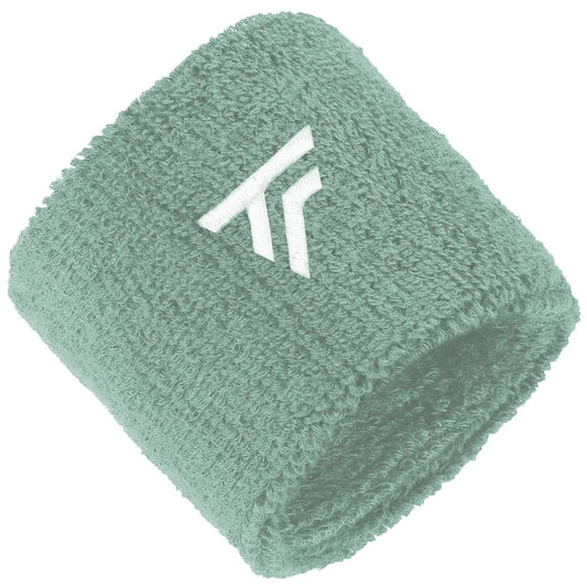 The Tecnifibre 2026 Tennis Wristband Sweatband 2 Pack in sage features a white embroidered logo with two diagonal lines, offering shock absorption and shown against a white background.