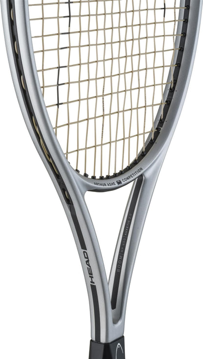 Close-up of the silver HEAD Arthur Ashe Competition 2025 Tennis Racket, featuring Auxetic 2.0 technology and limited-edition "Competition" branding—crafted by HEAD for serious players.