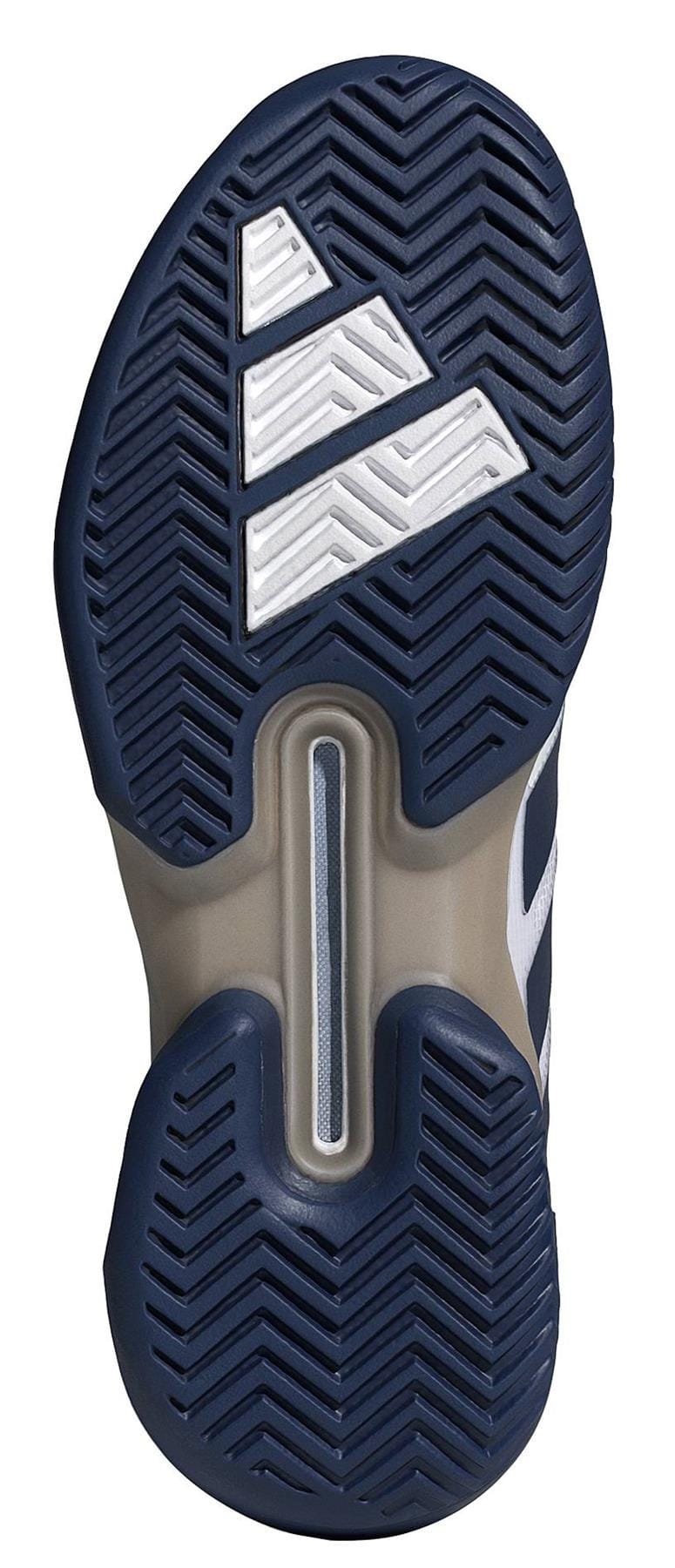 The image displays the sole of the adidas Adizero Ubersonic 5 Men's Tennis Shoe in White/Navy, featuring a dark blue zigzag rubber tread, white textured accents, and a central groove revealing a lighter gray section.