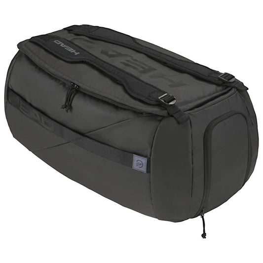 The HEAD Pro X Tennis Duffle Bag L in black is a spacious and robust carrier crafted from recycled PET bottles. It features multiple zippers and handles, with the "HEAD" brand prominently displayed on top. Ideal for travel or sporting activities, it offers both durability and style.
