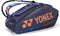 The Yonex 92429EX 9 Racket Pro Tennis Bag in Midnight Navy features multiple zippered compartments, Thermo Guard, a large side pocket, and adjustable shoulder straps—ideal for your tennis or badminton gear.