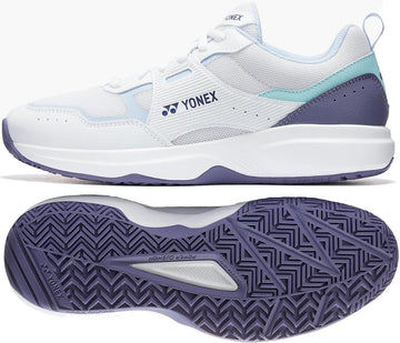 A pair of Yonex Pro-Move Classic Men's Tennis Shoes in White/Sax, shown from the side and bottom to highlight the design, sole tread pattern, and advanced Power Cushion technology.