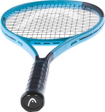 The HEAD Boom MP 2026 Tennis Racket by HEAD, in blue and black with black strings and "BOOM" on the side, features a logo on the handle cap, offers explosive power, and is shown against a white background.