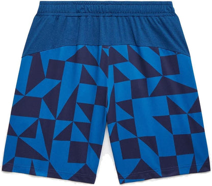 The Yonex 15240YX Knit Men's Tennis Shorts in Indigo Blue feature a geometric triangle and trapezoid pattern, an elastic waistband, solid navy top and waistband, and are made from breathable knit fabric.