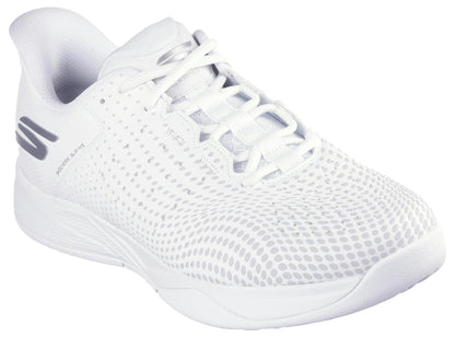 The Skechers Viper Court Reload Slip Ins Relaxed Fit Tennis Shoes in white feature a textured, dotted upper, white laces and sole, Arch Fit support, gray heel accents, and a sleek design for all-day comfort and style.