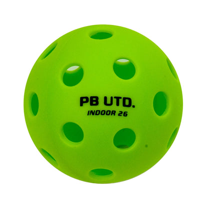 The Pickleball United Education 6 Player Indoor Pickleball Set features bright green perforated balls marked "PB UTD. INDOOR 26," perfect for indoor play and compatible with your favorite Pickleball United paddles.