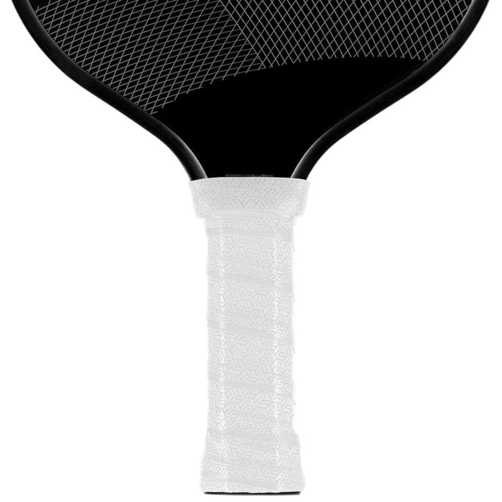 A close-up of a black paddle features the Lizard Skin DSP Ultra Pickleball Grip 0.8mm in Diamond White, highlighting its tacky texture and showing the strings and part of the paddle head against a white background.
