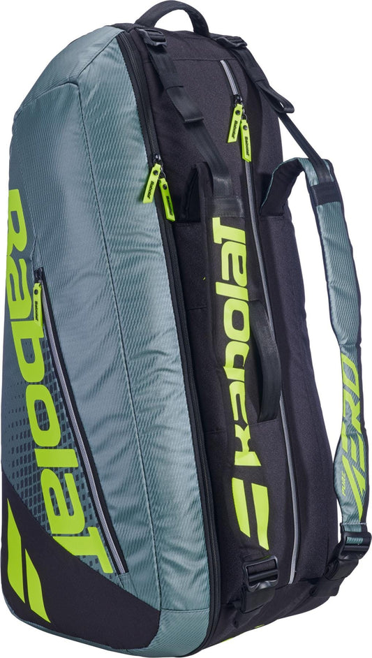 The Babolat RH6 Pure Aero 6 Racket Tennis Bag in grey and yellow features shoulder straps, neon yellow accents, and the Babolat logo on the side—combining style and function for tennis players.