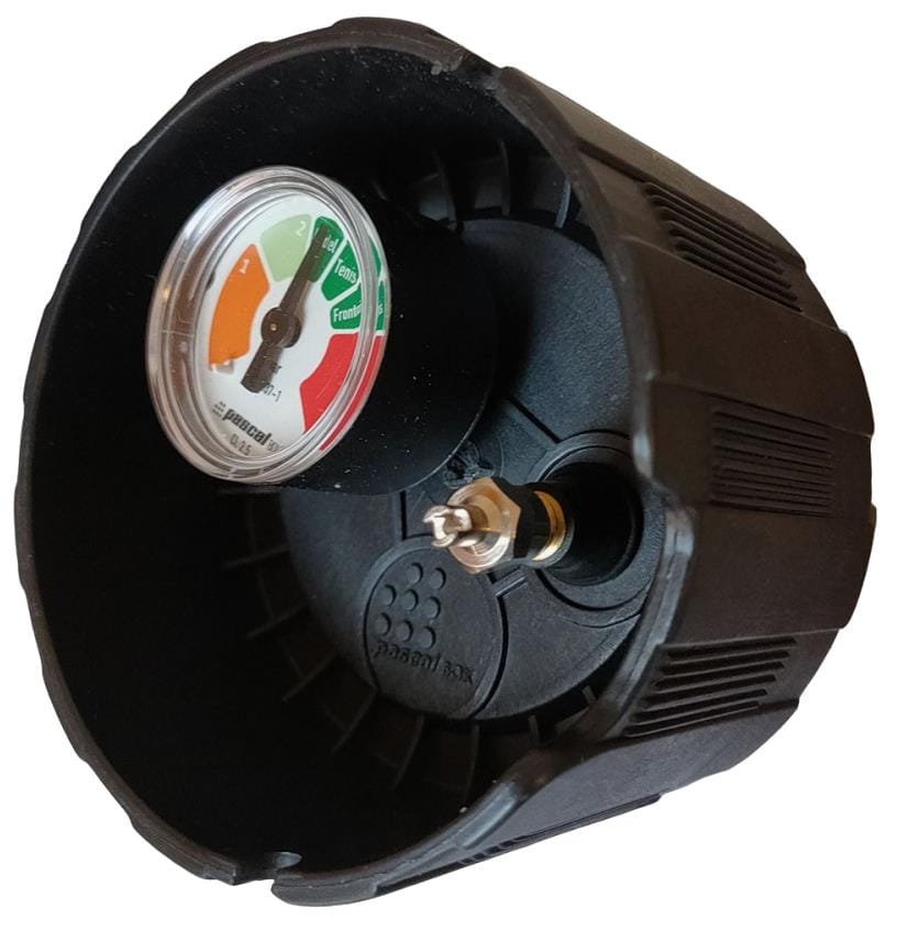 A close-up of the Bullpadel Pascal Tennis Ball Pressuriser - 3 Ball Tube cap shows a circular pressure gauge with red, yellow, and green zones mounted on a threaded metal valve.