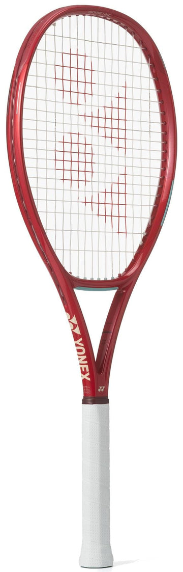 The Yonex VCORE 100L Ruby Red 2026 Tennis Racket features a striking red frame, white strings, and white grip, offering excellent spin potential on every shot.