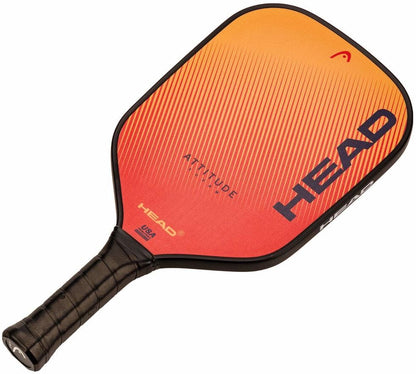 The HEAD Attitude SUPRM Pickleball Paddle by HEAD features an orange-to-red gradient face, black edge guard and grip, with "HEAD" diagonally printed—ideal for beginners wanting spin control.