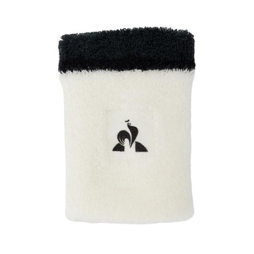 Pair your Le Coq Sportif Tennis Sweatband - Marshmallow with a white towel featuring a black top edge and centered rooster logo—stay stylish and sweat-free on the court.